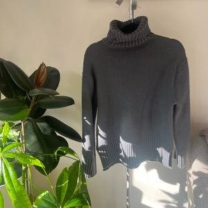 dark grey turtleneck sweater